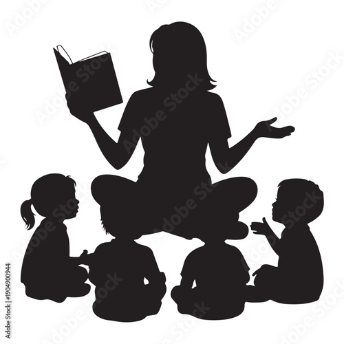Silhouette of woman reading to children book