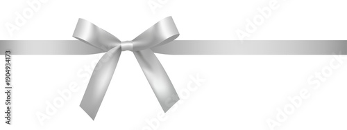 Fotografía Silver bow with long silver ribbon isolated on transparent background, made in realistic style