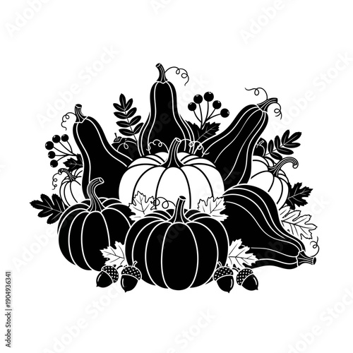 An arrangement of pumpkins gourds leaves and acorns in black and white