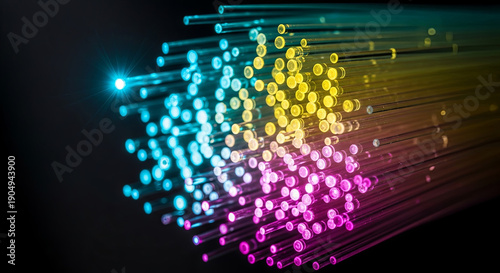 Vibrant fiber optic cables in rainbow colors shining brightly