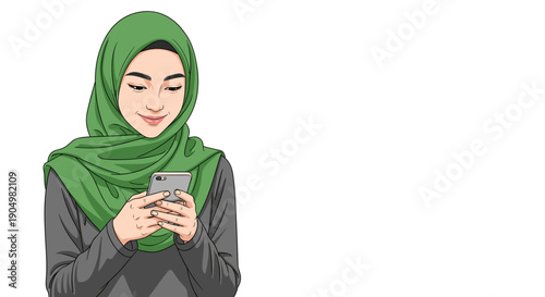 hijab of young Muslim woman in green hijab and grey top holding a smartphone, looking down with a gentle and pleasant smile while using her device.