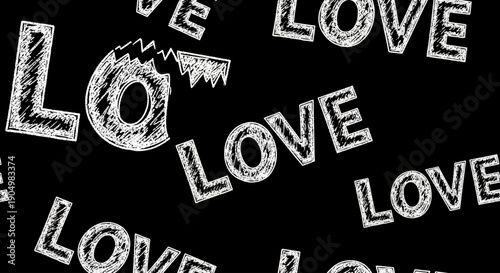 A collection of white 'LOVE' text on a black background viewed from directly above as illustrations