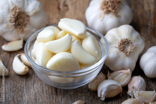 Garlic cloves in a glass bo...