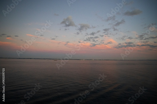 sunset over the ocean on a cruise ship