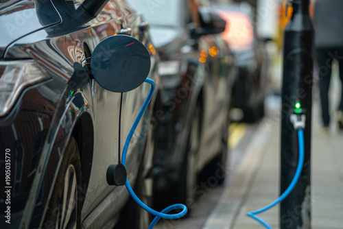 Tableau sur toile Close-Up Of EV Electric Car Charger, EVSE Connector, Vehicle Inlet, Charging Fla