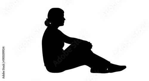 Silhouette of a woman sitting down looking to the right.
