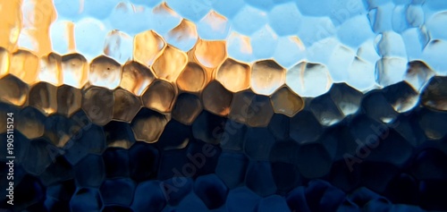 Abstract frosted glass with techno futurism light refraction. Modern honeycomb geometric pattern and blue gold bokeh distortion, ideal for futuristic technology and web backgrounds