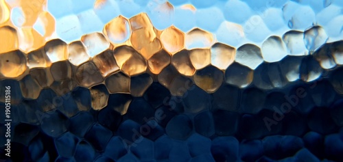 Abstract frosted glass with techno futurism light refraction. Modern honeycomb geometric pattern and blue gold bokeh distortion, ideal for futuristic technology and web backgrounds