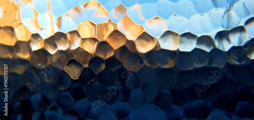 Abstract frosted glass with techno futurism light refraction. Modern honeycomb geometric pattern and blue gold bokeh distortion, ideal for futuristic technology and web backgrounds