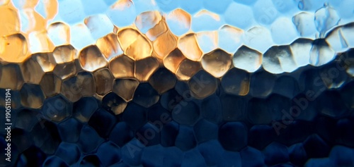 Abstract frosted glass with techno futurism light refraction. Modern honeycomb geometric pattern and blue gold bokeh distortion, ideal for futuristic technology and web backgrounds