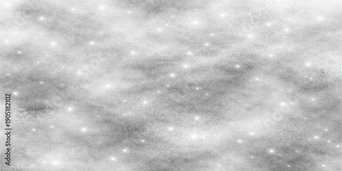 Abstract winter sky background with falling snowflakes and glowing stars amidst blue clouds and soft light particles for a festive Christmas holiday pattern