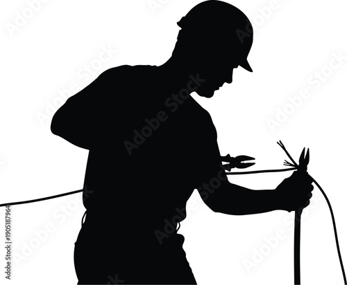 Man welding metal with sparks in a workshop viewed from the side