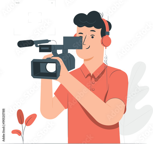 A cameraman wearing headphones operates a video camera with a focused expression from a close-up viewpoint