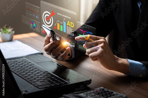 Tablou pe pânză Business professional using smartphone and laptop with digital marketing analyti