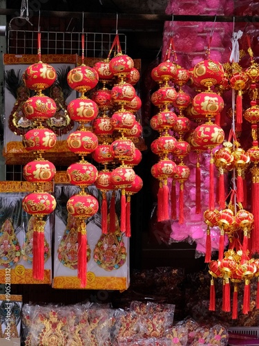 Tableau sur toile Traditional Chinese New Year decorations with red lanterns and gold Chinese char