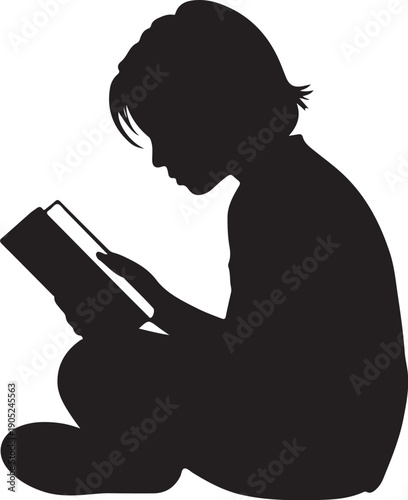 Silhouette of a person sitting and reading a book