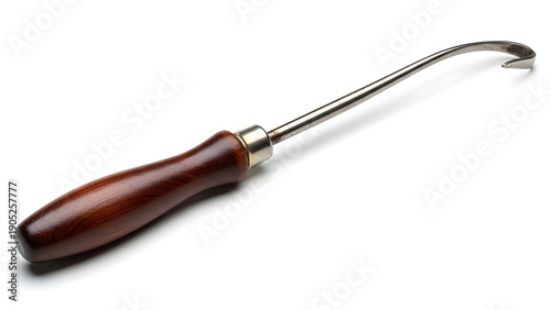 A professional-grade hoof pick with a comfortable wooden handle for equine hoof care and maintenance