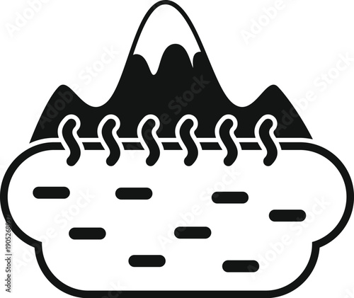 Hot spring bath with steam rising in front of a mountain peak