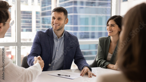 Quadro em tela Company boss greets corporate client, investor or shareholder with handshake ges