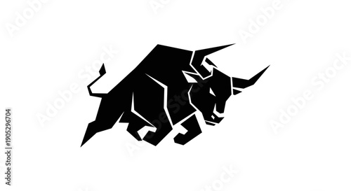 Aggressive Black Bull Silhouette Charging Forward.