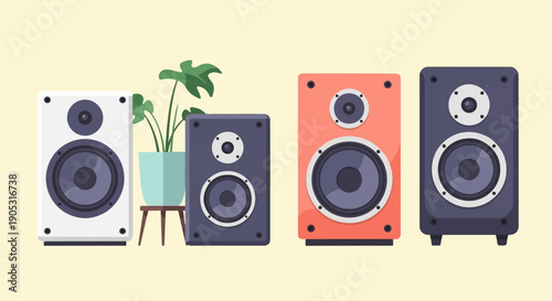 Four speakers and a potted plant arranged in a line