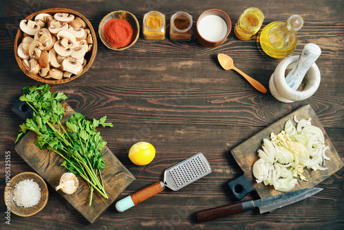 Schilderij op canvas Ingredients and tools for cooking on wooden table with spices and vegetables