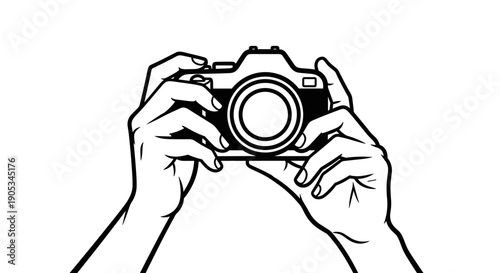 Hands holding a vintage camera for photography.