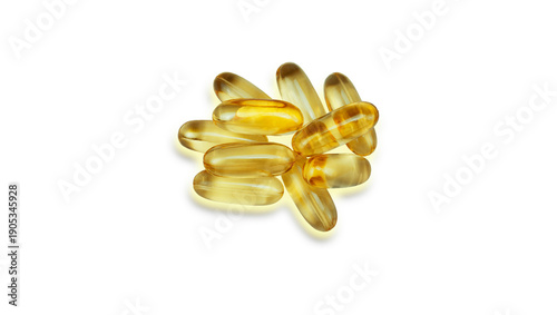 Omega 3 capsuls on white background. Fish oil gold capsuls. High quality photo