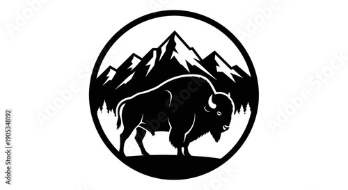 Majestic Bison Silhouette Against Mountain Landscape Emblem.