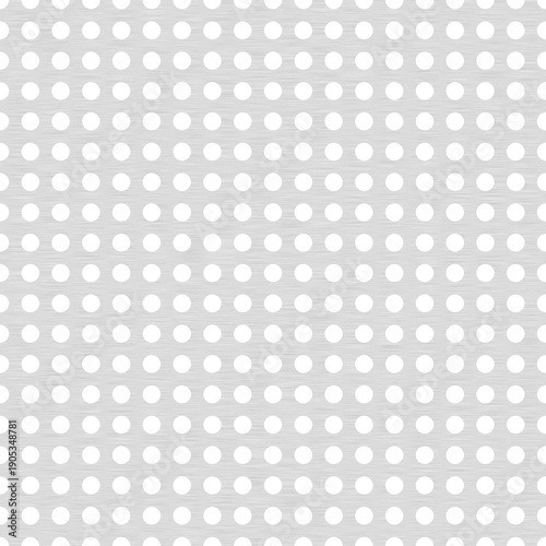 Gray perforated metal sheet with uniform circular holes in straight line pattern