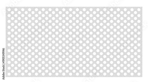 Gray perforated metal sheet with staggered circular holes in offset pattern