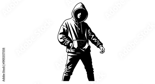 Mysterious Hooded Figure Standing in Silhouette.