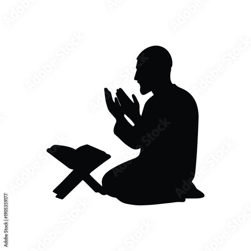 Muslim man kneeling and praying with Quran silhouette isolated on white background