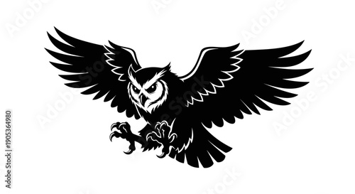 Silhouette of a Fierce Owl in Flight with Wings Spread Wide.