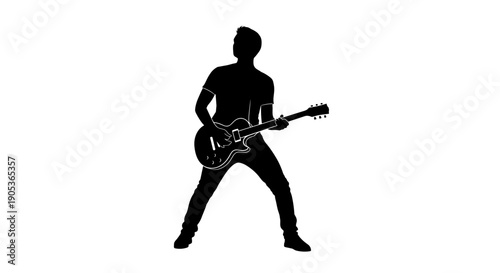 Silhouette of a man playing an electric guitar.