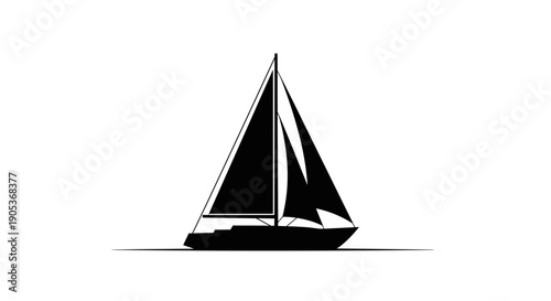 Silhouette of a Sailing Yacht with Full Sails.