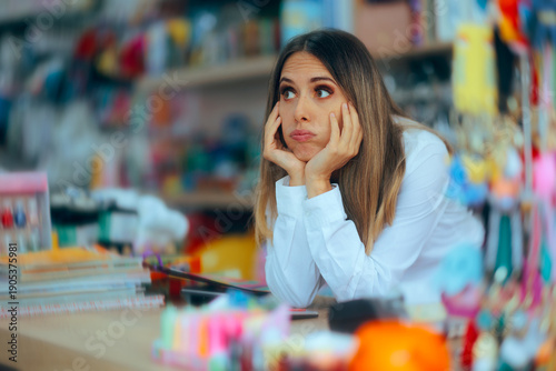 Cuadro en lienzo Sad Tired Saleswoman in a Store Waiting for Customers