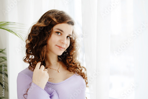 Beautiful brunette model girl with long curly hair. Smiling woman hairstyle wavy curls. Cosmetology and hair care. Fashion, beauty and make up portrait. Free Download Beautiful brunette model girl with long curly hair. Smiling woman hairstyle wavy curls. Cosmetology and hair care. Fashion, beauty and make up portrait. - GFXLoad