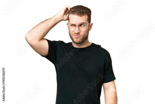 Photography Young handsome blonde man over isolated chroma key background having doubts whil