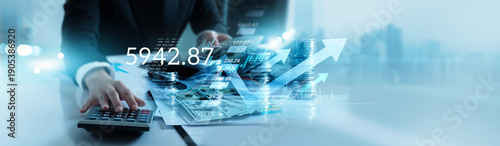 Business finance and investment concept, Businessman calculating and analyzing financial data report with business graph growth chart and world economic, Stock, Banking, Accounting.