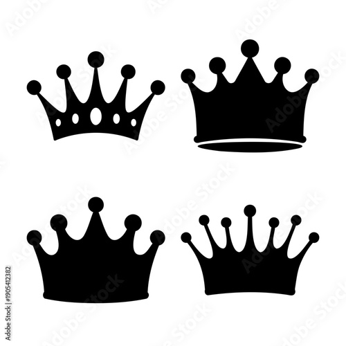 Collection of four distinct black crown silhouettes for royal and regal design elements