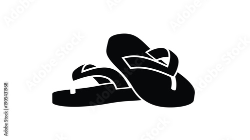 Black flip flops resting on a white surface a striking silhouette