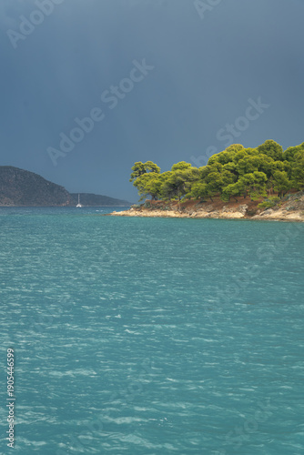 Ermioni bay and coastal park with waterfront views and calm Mediterranean waters in the Peloponnese, Greece.
