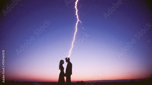 Silhouettes of two people standing apart but connected by a single, glowing thread of light, minimalist landscape at sunset