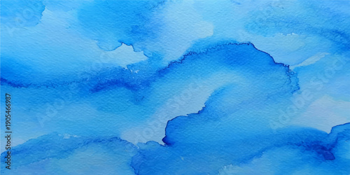 An abstract blue watercolor background with a grunge paper texture features flowing paint patterns resembling a summer sky or water map for an artistic nature design