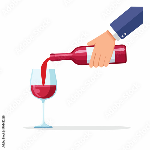 Hand pouring red wine from bottle into glass