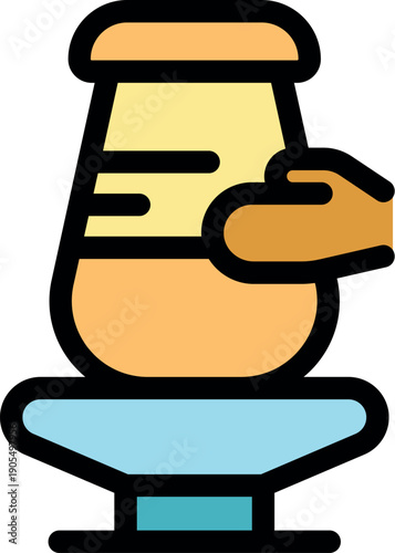 Potter carefully shaping a clay vessel on a pottery wheel, demonstrating craftsmanship and artistic skill