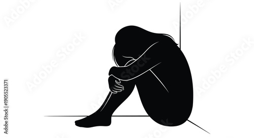 A solitary figure sits huddled against a wall conveying feelings of sadness and despair silhouette high quality professional detailed modern elegant stylish