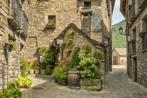 Photos Traditional stone house with flowers in Torla-Ordesa village Pyrenees Spain