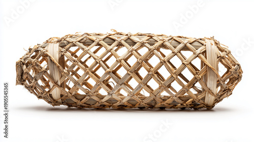 Traditional fish trap bubu with woven bamboo structure, isolated on white background.